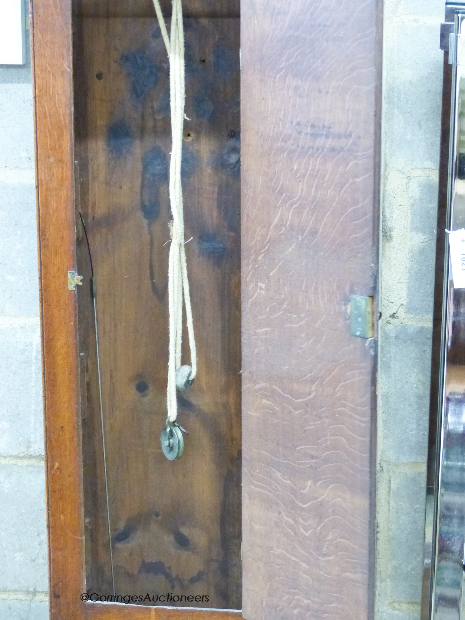 An 18th century oak 30 hour long case clock Thomas Read of Stevenage. H-213cm.